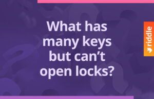 What has many keys but can’t open locks?