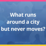 What runs around a city but never moves?