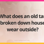 What does an old tan broken down house wear outside?