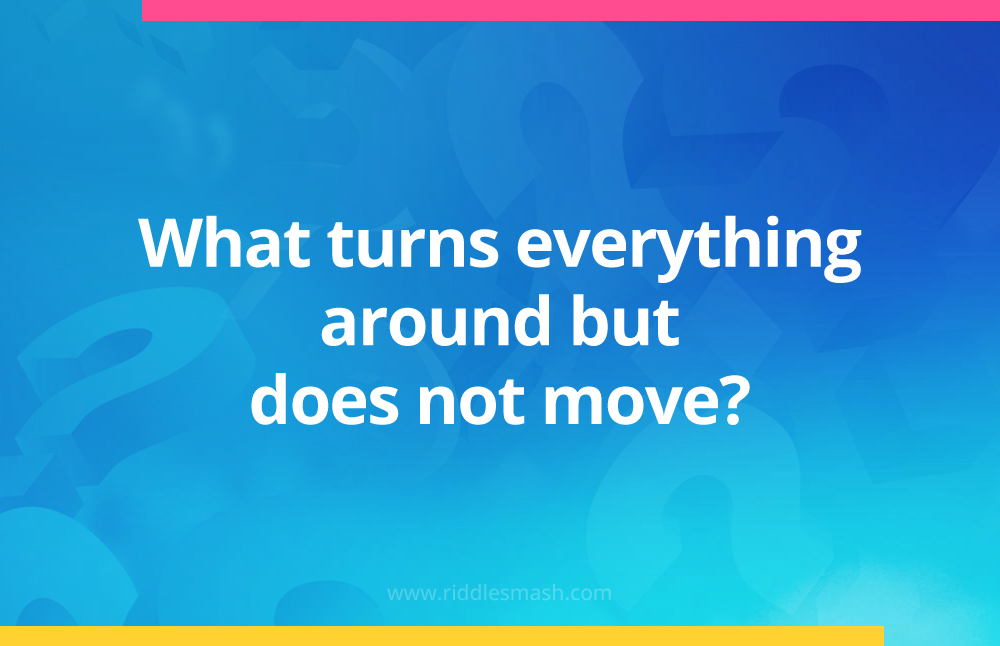 What turns everything around but does not move?